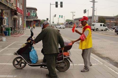 违规|沈北违规电动车司机成为“特别志愿者”，上街宣传文明交通
