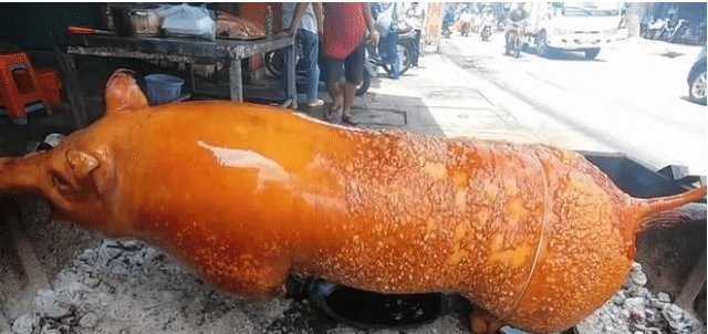 美食|去越南旅游吃“烤乳猪”,没忍住1200元买了一整只,切开后这是烤猪