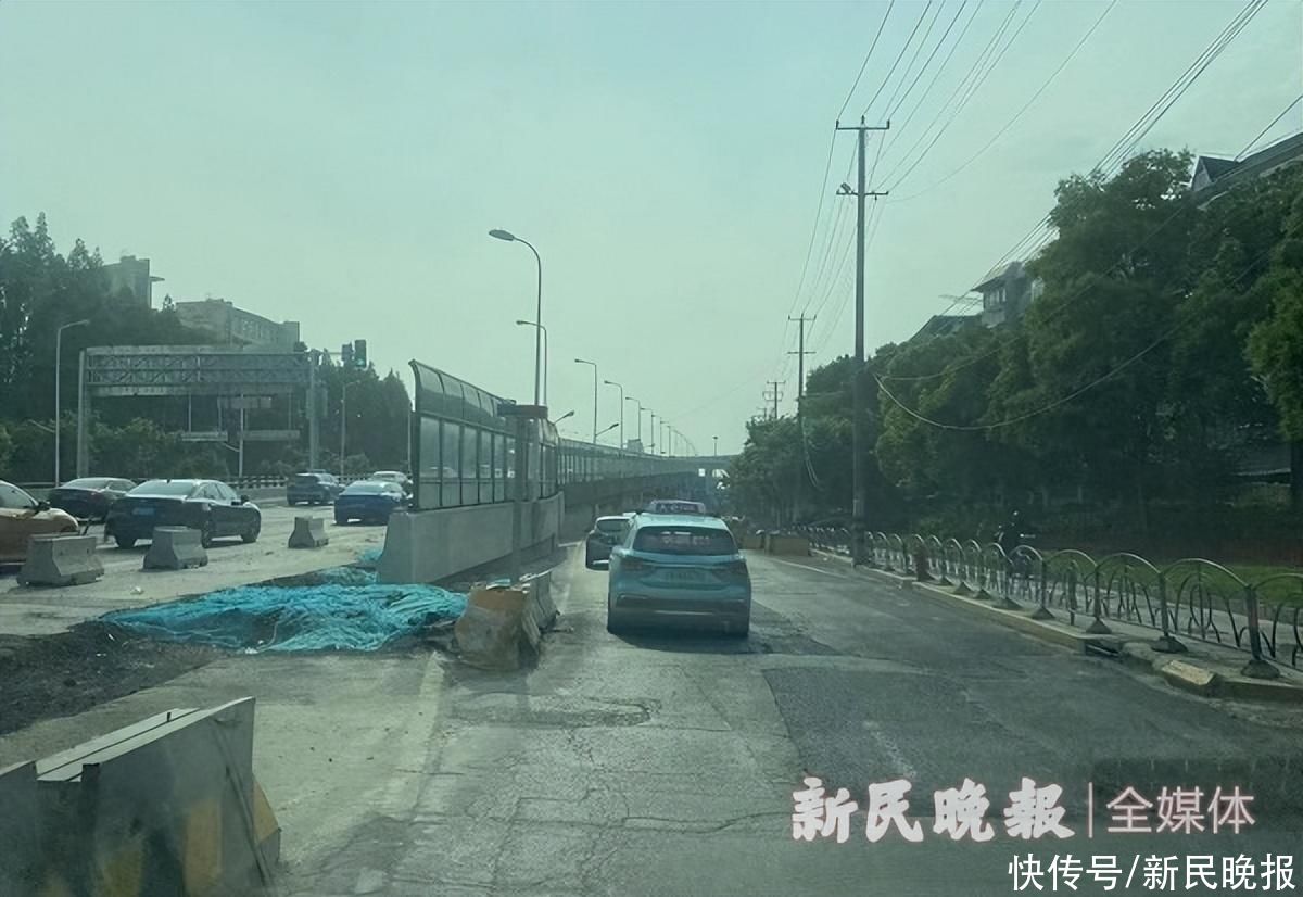 道路坑洼车辆驶过剧烈颠簸 市民盼相关部门做好整修