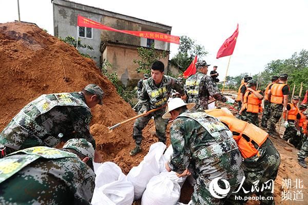 村民|抗洪大堤，一个“盛产”英雄的地方