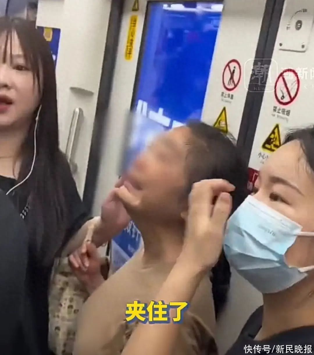 上海一女子被地铁门夹背疼痛大哭！好心乘客果断转动紧急装置！这样做对吗？