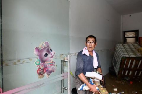  居民|组图 | “孤岛”水退后 安徽固镇部分居民开始返家