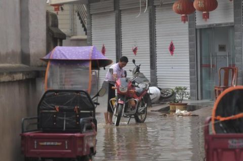  居民|组图 | “孤岛”水退后 安徽固镇部分居民开始返家