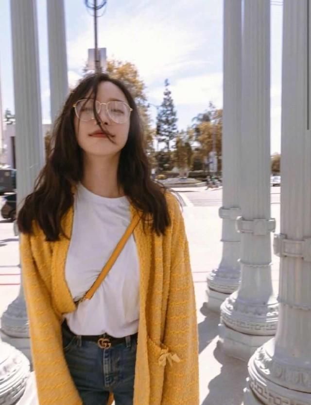  hold|倪妮要不要这么飒？新造型气场“一米八”，锯齿刘海也能轻松hold住