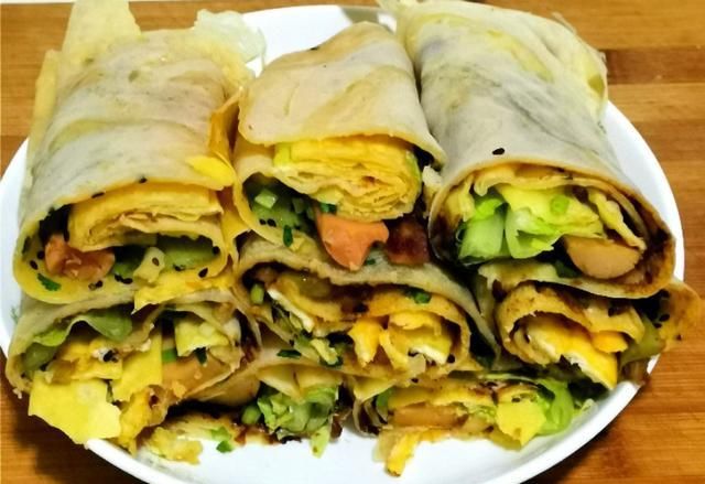 火腿肠|家庭版杂粮煎饼的好吃做法，酥脆可口，比外面买的还好吃。